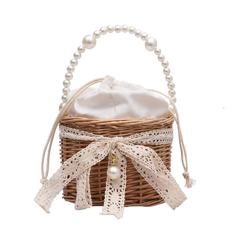 New Niche Design for Women 2023 Summer Trendy Woven Pearl Handheld Basket Bag