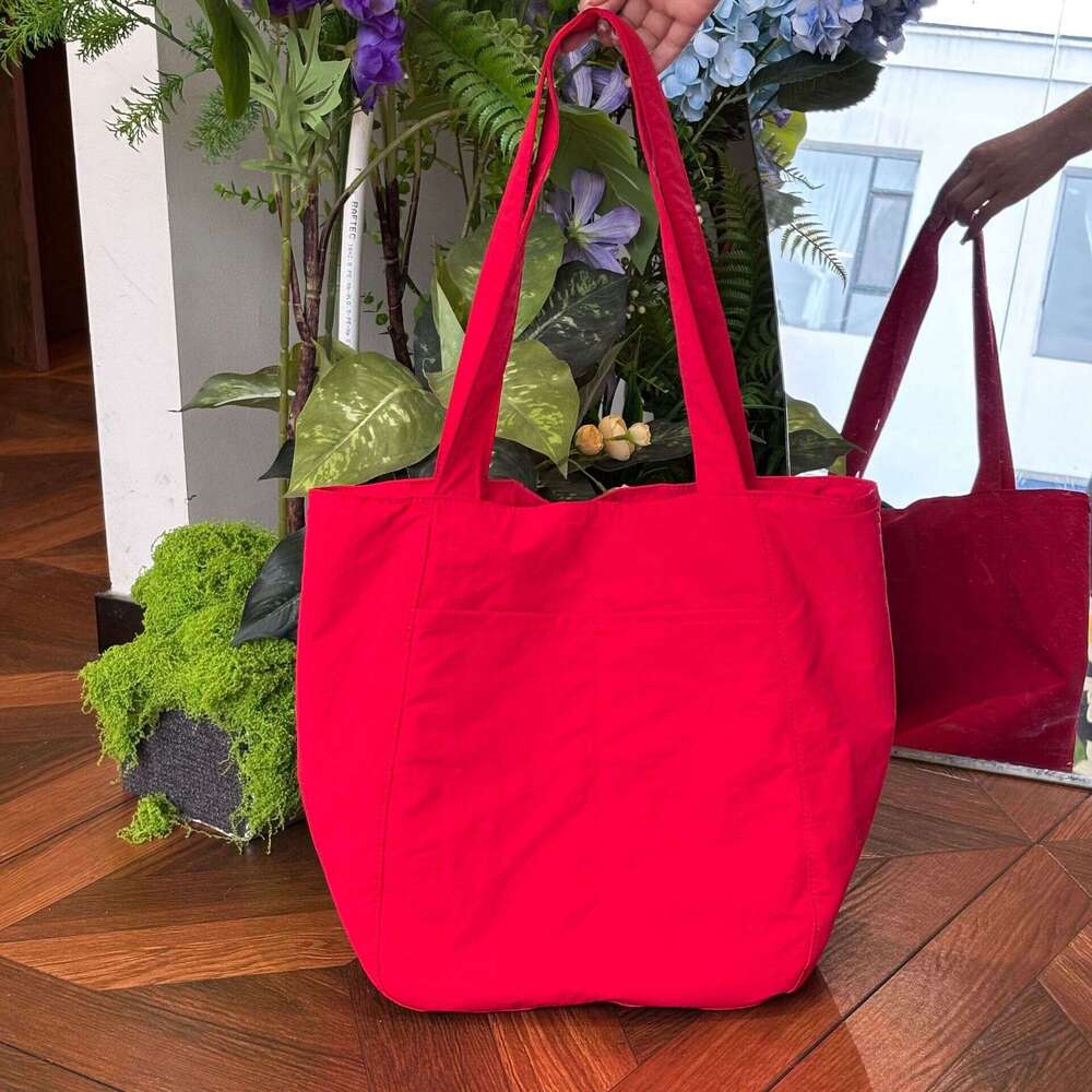 2025 New Canvas Casual Shoulder Versatile Women's Design Sense Large Capacity Commuter Tote Bag