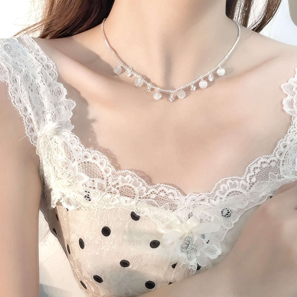 French Cat's Eye Stone Tassel Internet Celebrity Personality Light Niche Design Simple Exquisite High-end Versatile Necklace fb1