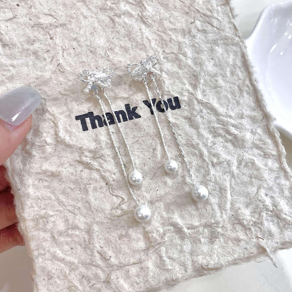 S Sier Needle Bowknot Tassel Sweet Cool Spicy Girl Social Details Artistic White Moonlight Holy Simple Women's Earrings 8e2