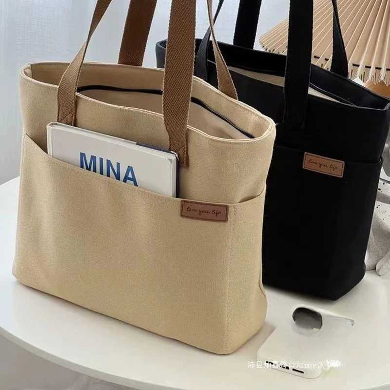 100% Authentic Product Brand New High Quality Fashionable Versatile Minimalist Womens Tote Bag Unisex Large Capacity Portable Canvas Handbag G250729