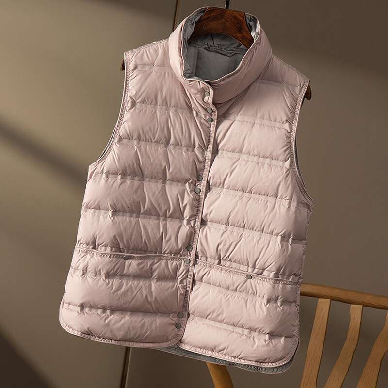 Designer Clothing 2025 Janveny 2025 New Winter Seamless Emed Puffer Gilets Women Ultra Light Stand Collar Short Vest White Duck Down Soft Waistcoat