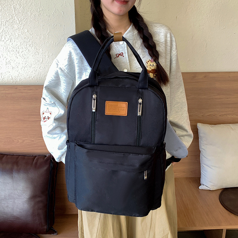 New designer 2025 girls' backpack, student backpack, waterproof travel bag