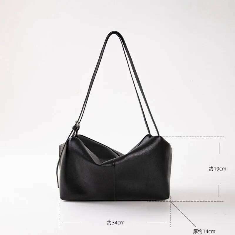 First layer cowhide shoulder 2025 new niche leather capacity lazy style high-end women's one-shoulder large tote bag