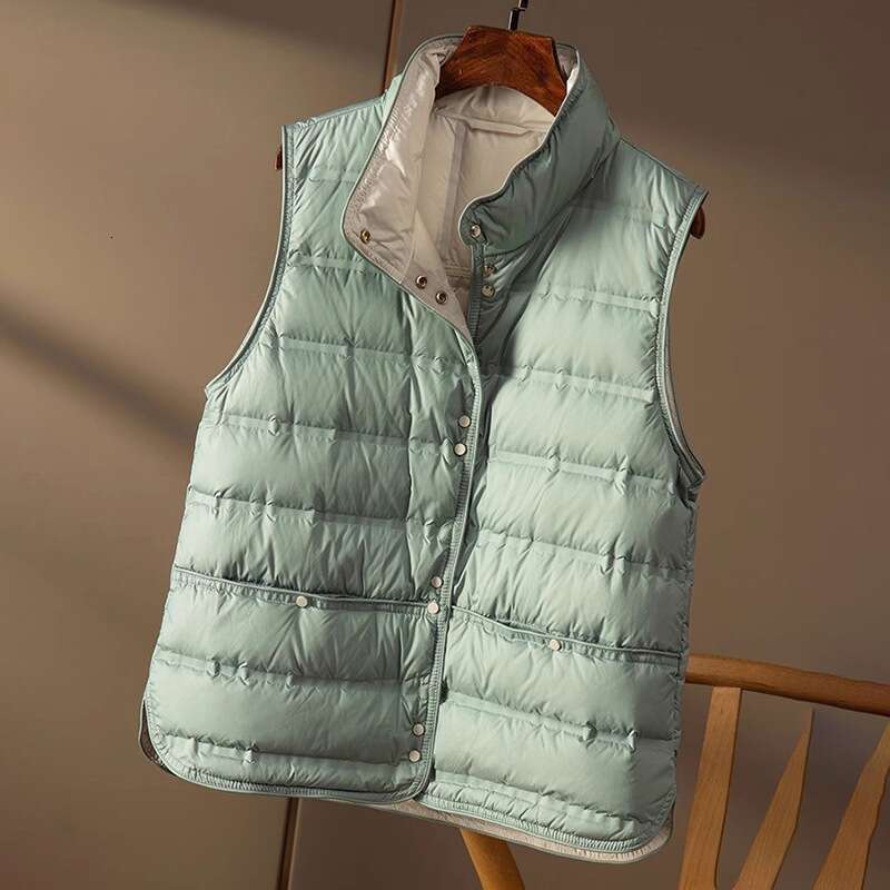 Designer Clothing 2025 Janveny 2025 New Winter Seamless Emed Puffer Gilets Women Ultra Light Stand Collar Short Vest White Duck Down Soft Waistcoat