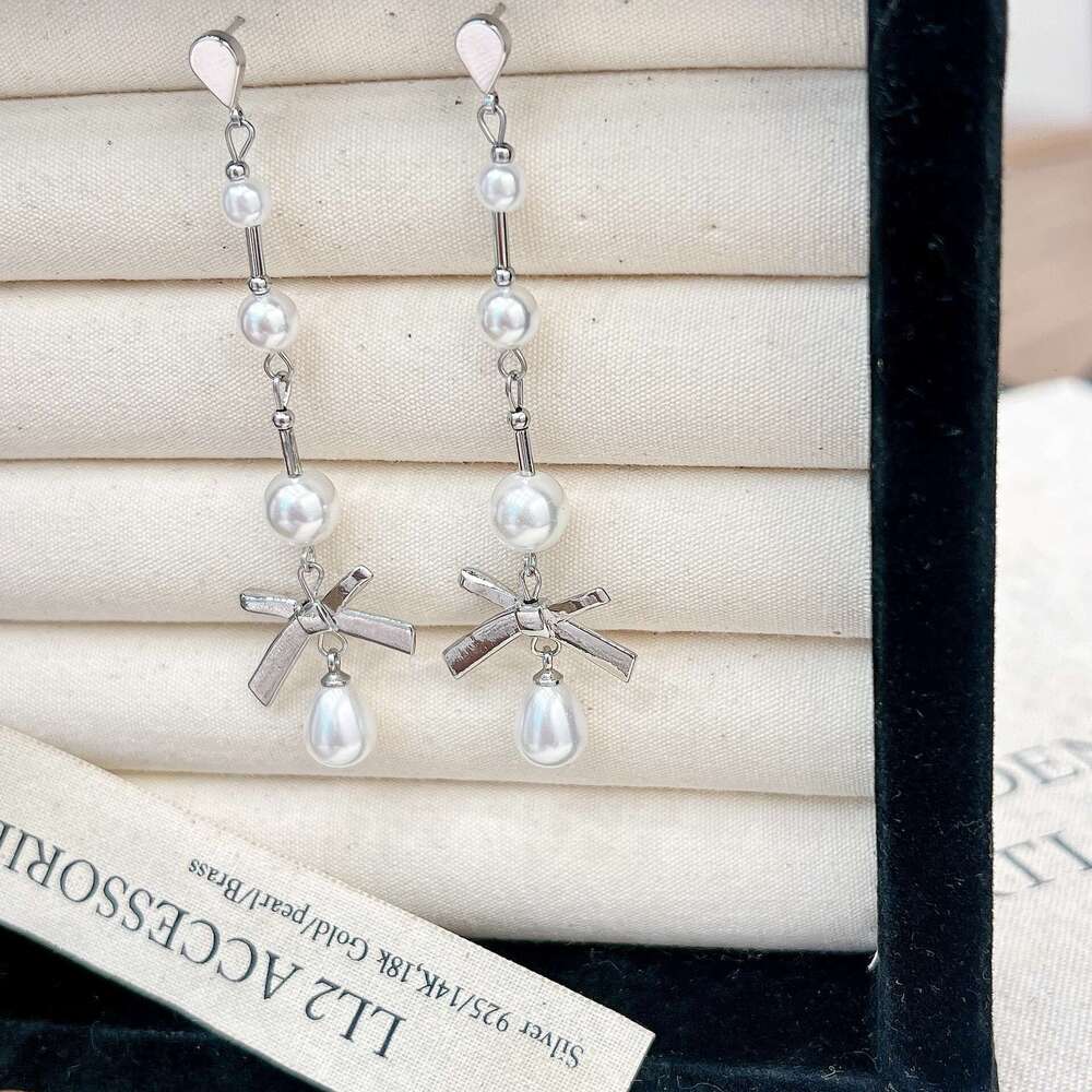 Simple Elegant Exquisite High-end Pearl Long Style Light Niche Bow Sweet Earrings 590
