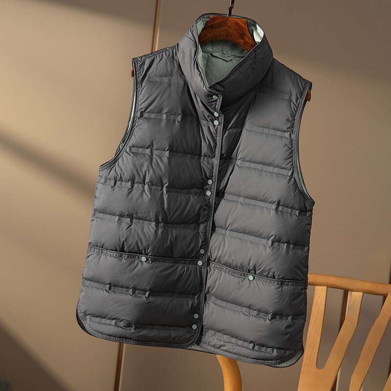 Designer Clothing 2025 Janveny 2025 New Winter Seamless Emed Puffer Gilets Women Ultra Light Stand Collar Short Vest White Duck Down Soft Waistcoat