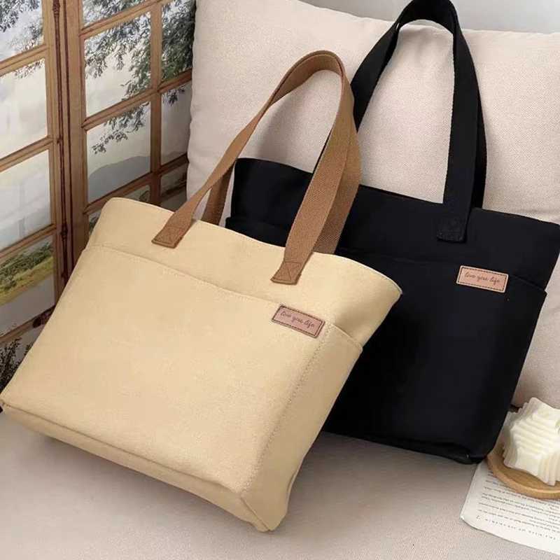 100% Authentic Product Brand New High Quality Fashionable Versatile Minimalist Womens Tote Bag Unisex Large Capacity Portable Canvas Handbag G250729