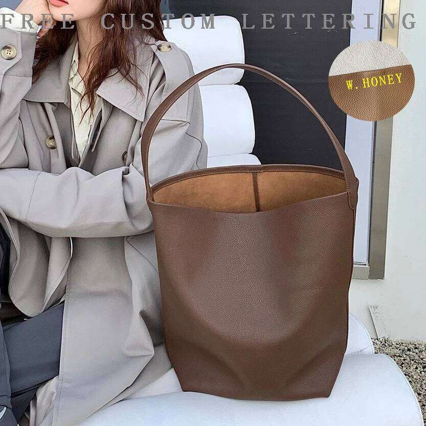 Genuine leather TOT 2025 new classic design cowhide large capacity casual armpit commuting simple ladies shoulder bag
