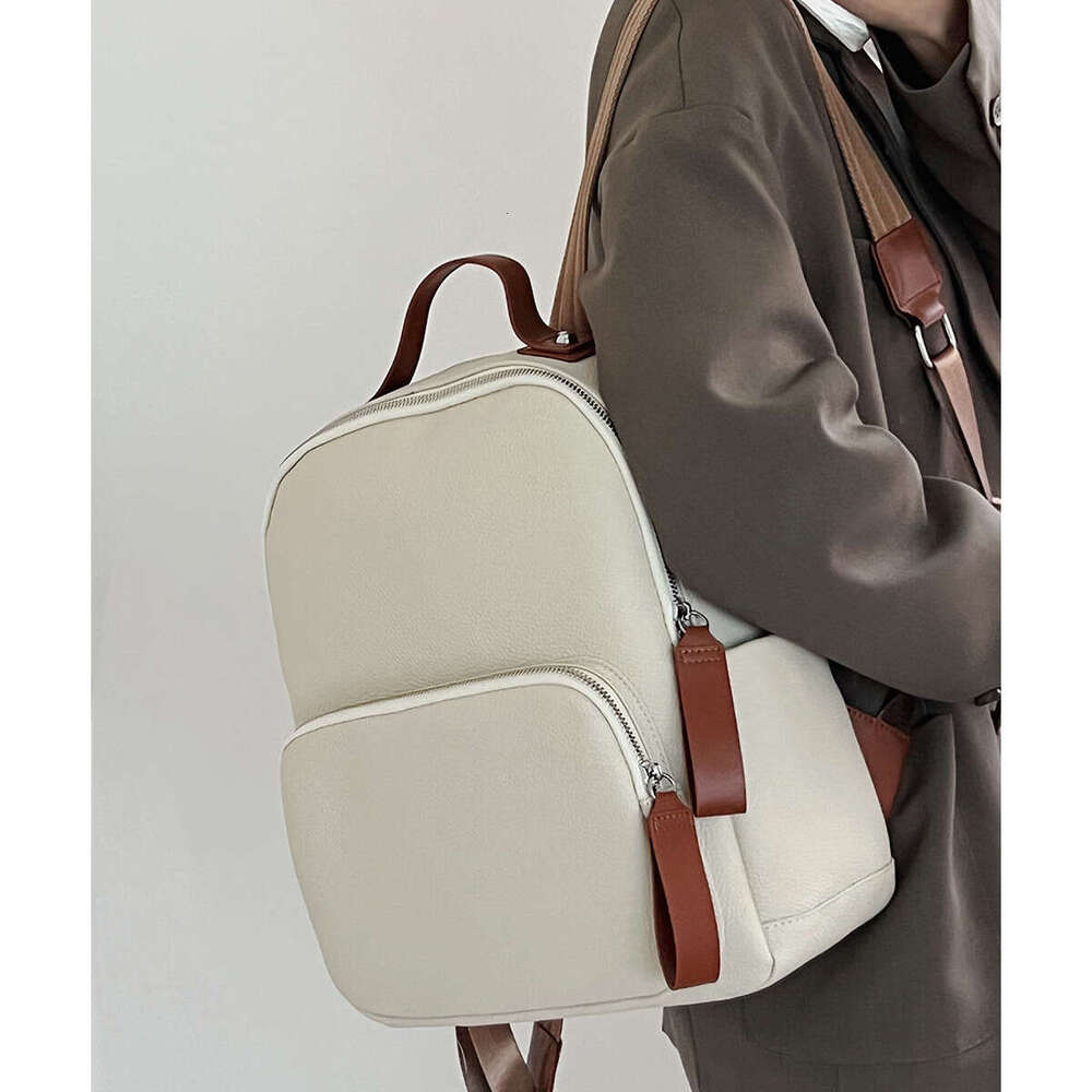 New Top Layer Cowhide for Women Large Capacity ISN Style Student Travel Backpack designer bag B5
