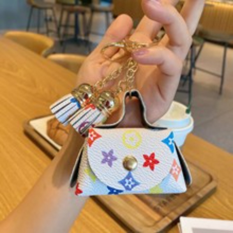 Designer Cute mini leather small bag, coin purse Luxury headphone bag storage bag floral pendant key card bag key bag, women's bag