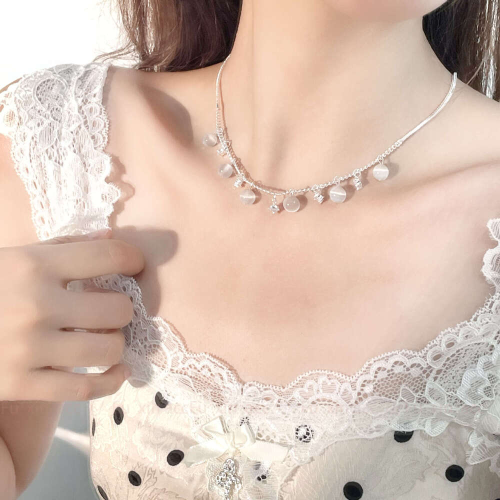 French Cat's Eye Stone Tassel Internet Celebrity Personality Light Niche Design Simple Exquisite High-end Versatile Necklace fb1