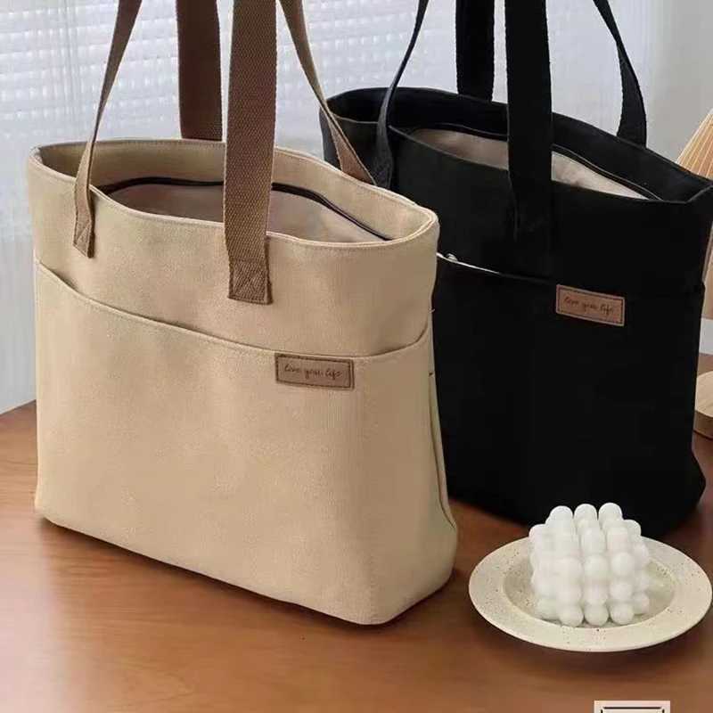 100% Authentic Product Brand New High Quality Fashionable Versatile Minimalist Womens Tote Bag Unisex Large Capacity Portable Canvas Handbag G250729