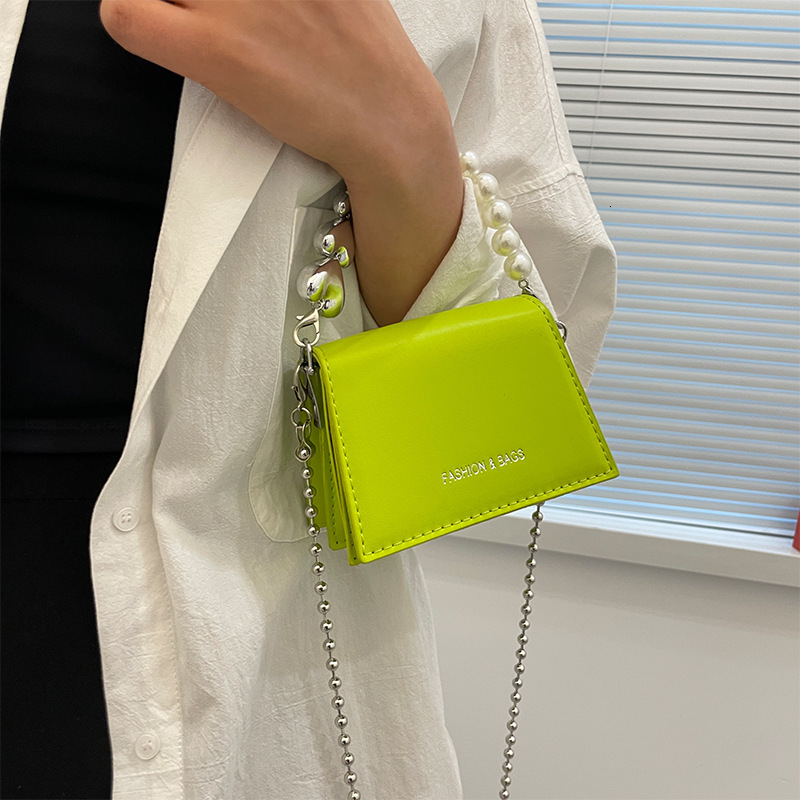 INS Personality Heart Mini Handbag Children's Handheld Crossbody Chain Lipstick Coin Small Women's Bag ddmymoon