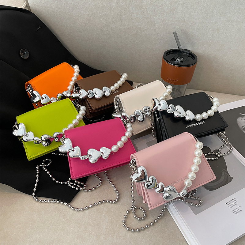 INS Personality Heart Mini Handbag Children's Handheld Crossbody Chain Lipstick Coin Small Women's Bag ddmymoon