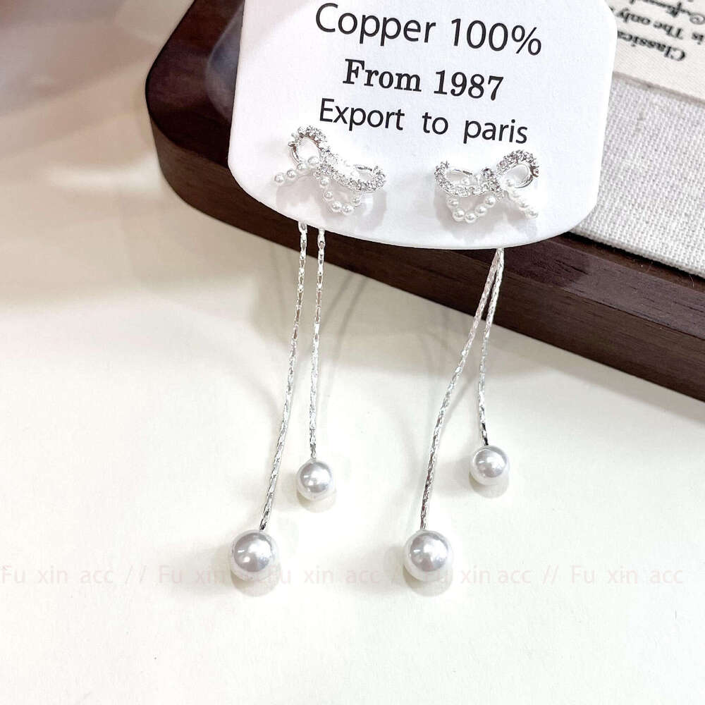 S Sier Needle Bowknot Tassel Sweet Cool Spicy Girl Social Details Artistic White Moonlight Holy Simple Women's Earrings 8e2