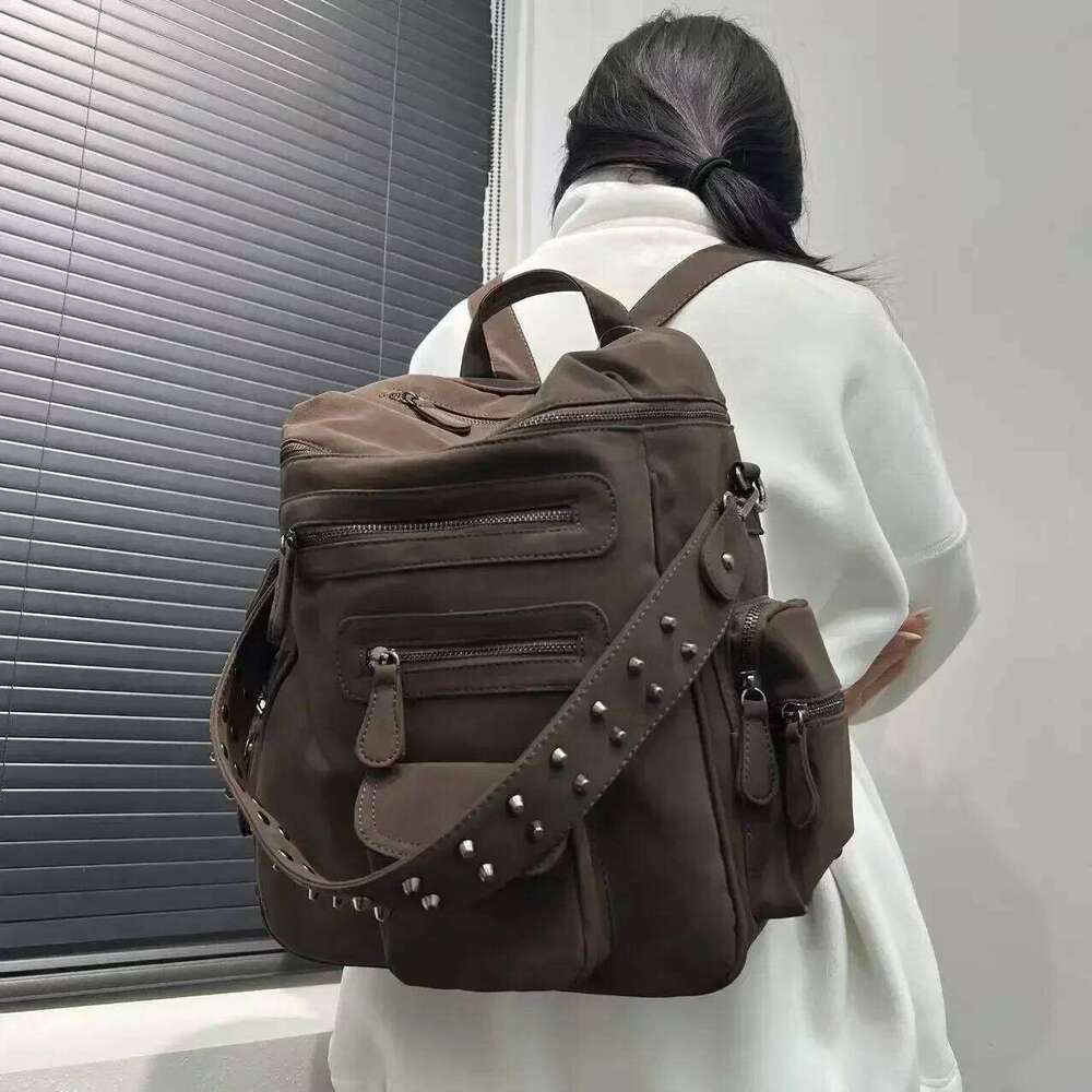 Ladies' Fashionable Frosted Vegan Leather With Large Capacity, Multiple Zippers, Rivets, And A Single Shoulder Bag