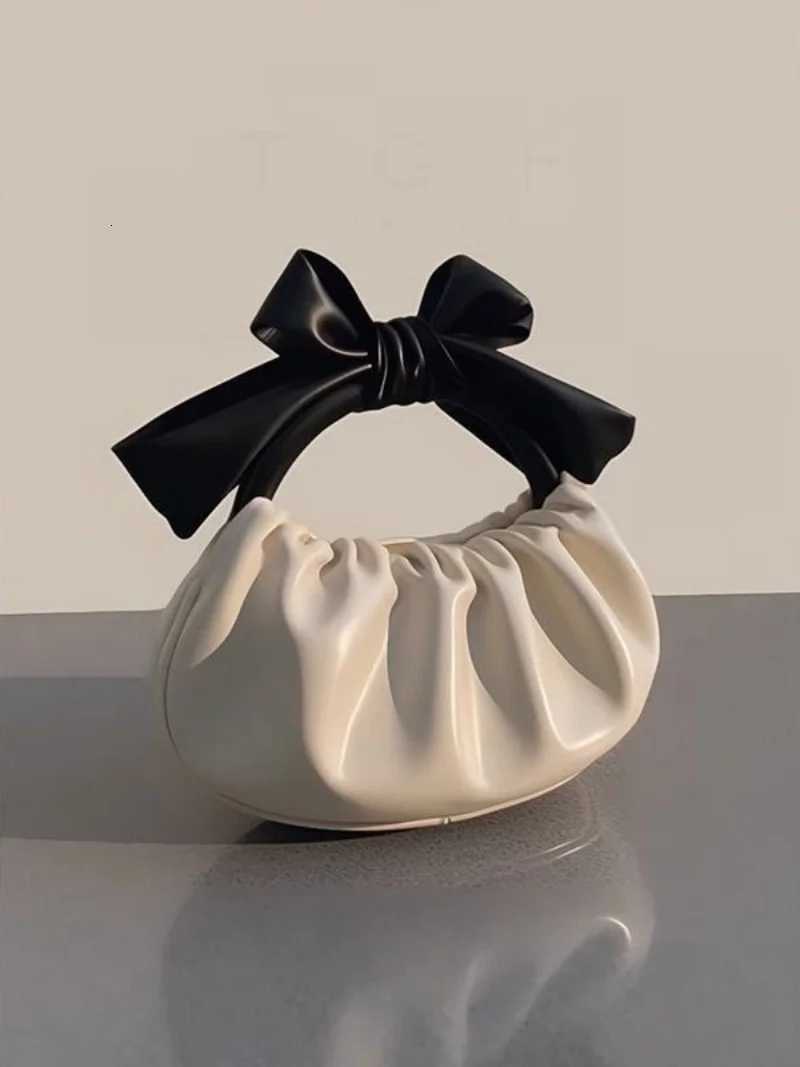 Handheld cloud bag womens new 2025 summer texture French niche fAshion bow fold crossbody bag Y250730