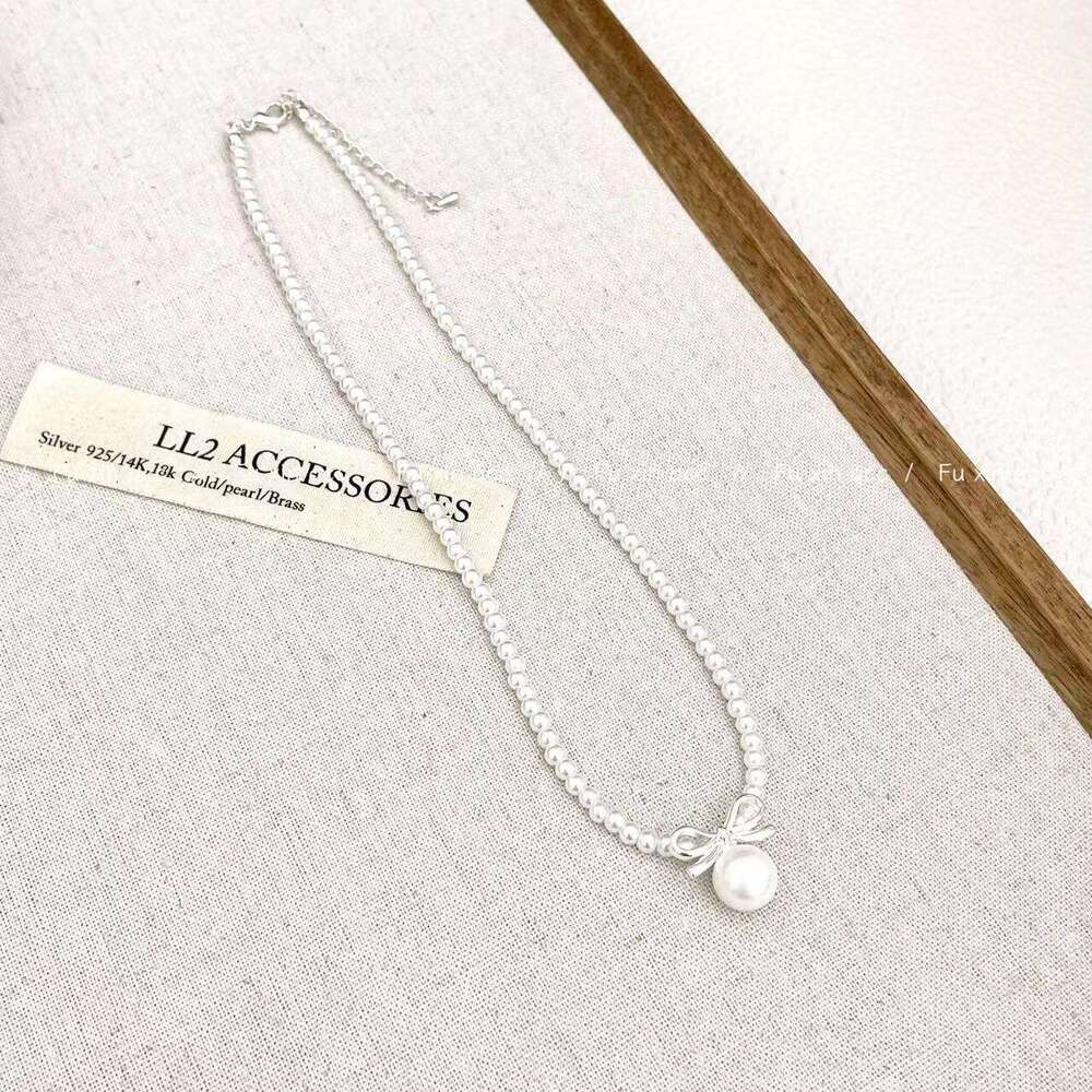 Cool Summer Pearl Bow Necklace for Women French Style High-end Clavicle Chain Light Niche Versatile Durable Jewelry cf6