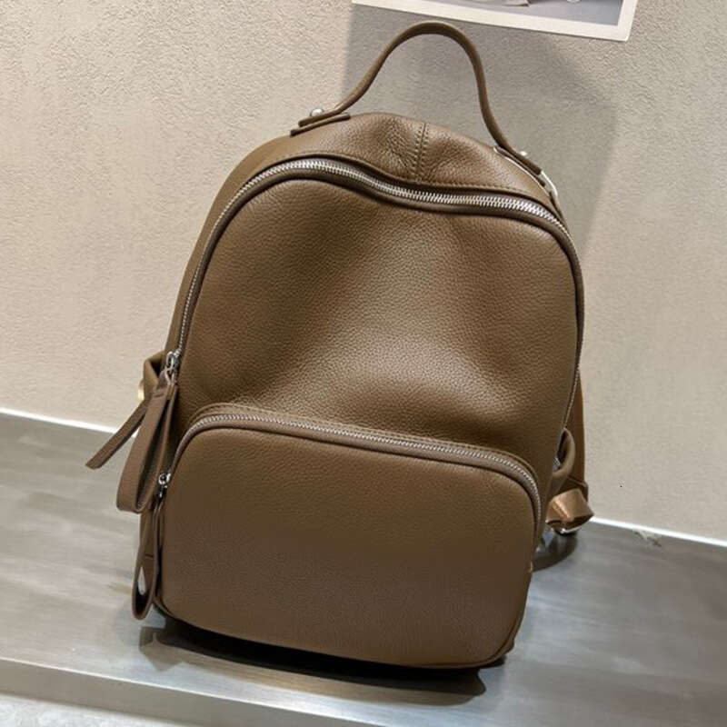 New Top Layer Cowhide for Women Large Capacity ISN Style Student Travel Backpack designer bag B5