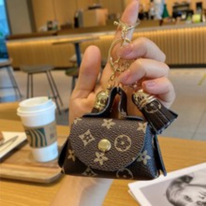 Designer Cute mini leather small bag, coin purse Luxury headphone bag storage bag floral pendant key card bag key bag, women's bag