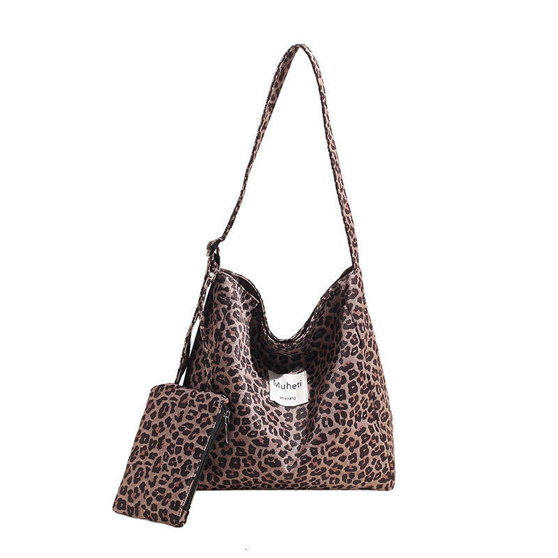 Leopard print canvas hand-held shoulder bag, large capacity mother and child bag design, fashionable street bag, casual versatile commuting women'