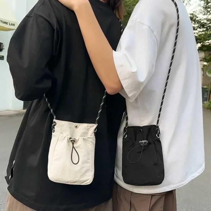 Korean Mini Nylon Shoulder Bag for Men Women Chic Crossbody Bucket Bag Casual Small Handbag Drawstring Buckle Purse Phone Pouch Y250730