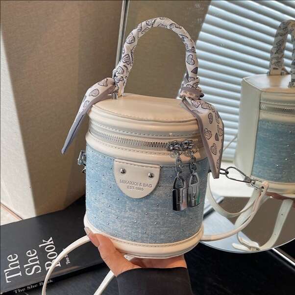 Cylindrical handbag - blue and white color blocked denim with diamonds PU leather single shoulder crossbody bag, fashionable and versatile, out on the