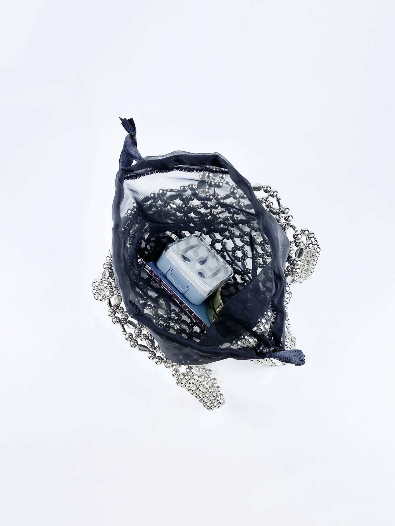 Fashionable niche shiny silver beaded bag woven lightweight hollow beaded versatile shoulder bag Y250730