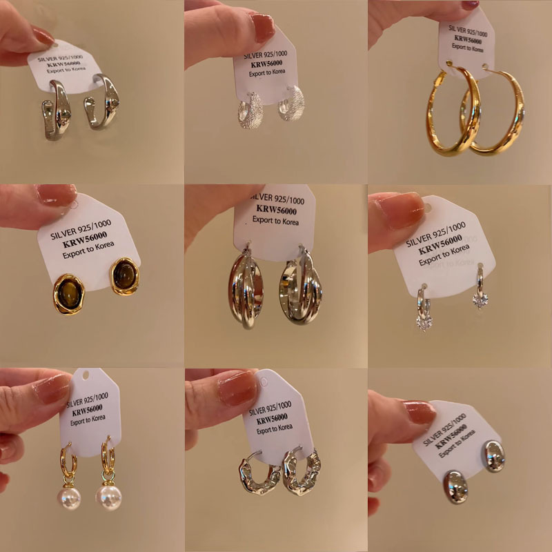 Free Shipping Designer Luxury Jewelry High-end Women's Round Earrings Fashionable Texture Smooth Metal Ring Earrings Niche Ear Hook