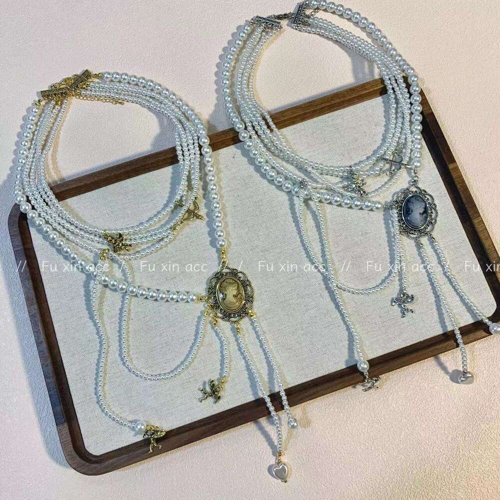 Angel Queen Multi-layer Pearl Tassel Necklace for Women Sweet Cool Light Sweater Chain Niche Design Choker 931