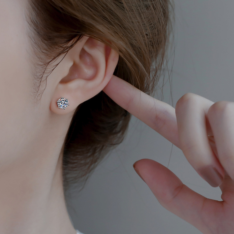 Designer's popular moissanite earrings with a stylish and elegant classic six-claw design for women. The ear jewelry is made of 925 sterling silv