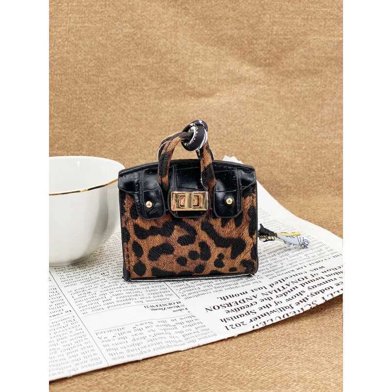 Exquisite New Versatile Snake Patterned House Mini Bag Multifunctional Portable Coin Purse Pendant Headphone Bag Y250731