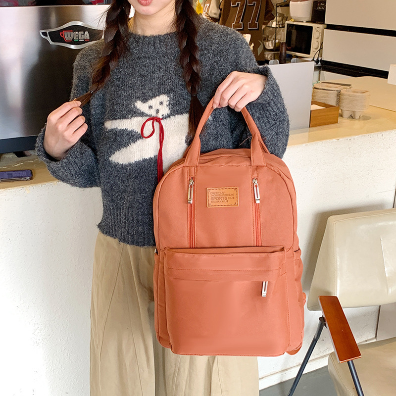 New designer 2025 girls' backpack, student backpack, waterproof travel bag