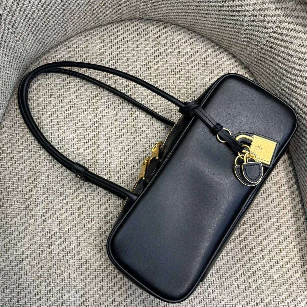 Cowhide Bowling 2025 New Vintage Lock Small Pendant Handbag Genuine Leather Women's Large Capacity Armpit Shoulder Bag