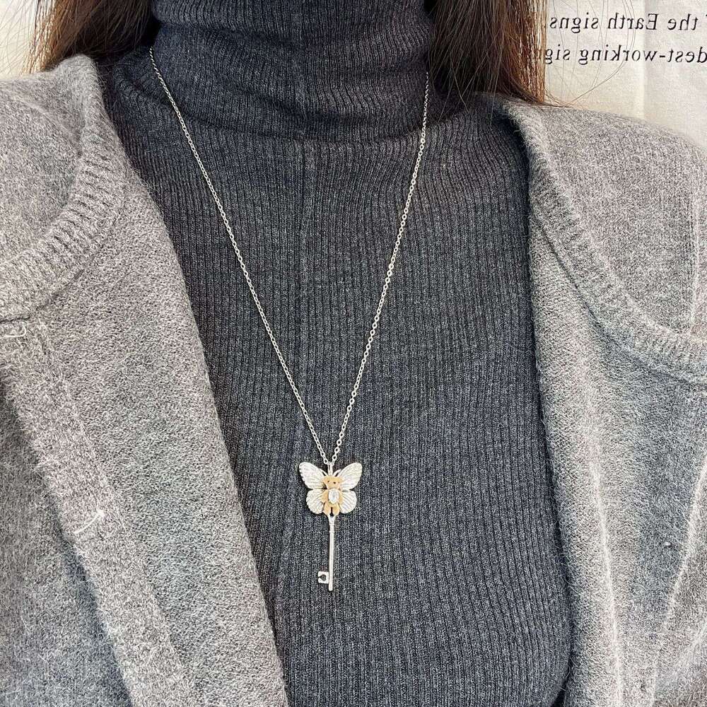 Little Bear Butterfly Key Pendant Necklace for Women, Autumn and Winter Accessories, Sweater Chain, Niche Design Sense, High-end Hoodie Chain Jewelry 