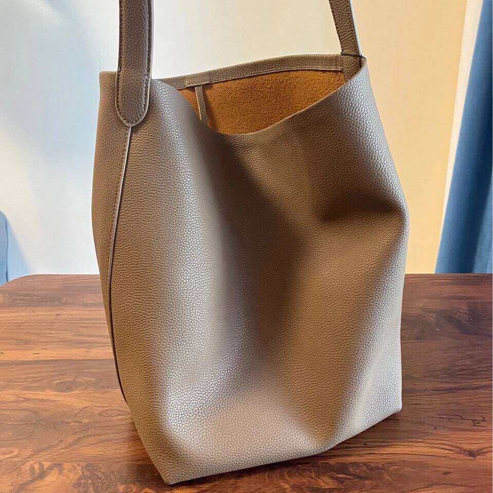 Genuine leather TOT 2025 new classic design cowhide large capacity casual armpit commuting simple ladies shoulder bag