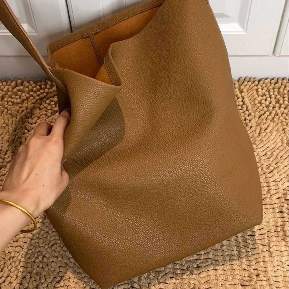 Genuine leather TOT 2025 new classic design cowhide large capacity casual armpit commuting simple ladies shoulder bag
