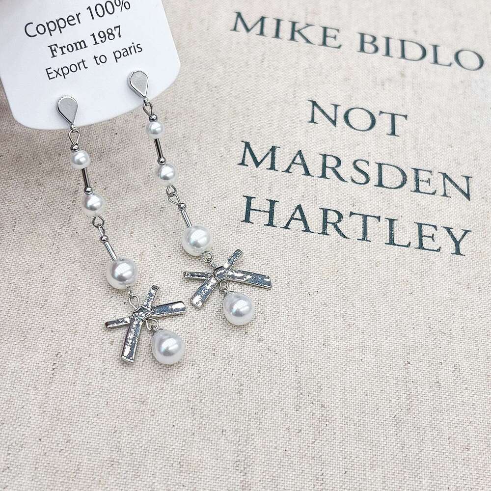 Simple Elegant Exquisite High-end Pearl Long Style Light Niche Bow Sweet Earrings 590