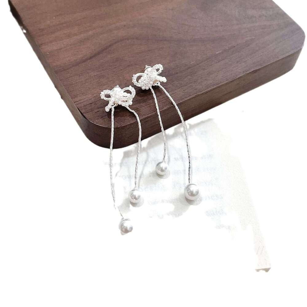 S Sier Needle Bowknot Tassel Sweet Cool Spicy Girl Social Details Artistic White Moonlight Holy Simple Women's Earrings 8e2