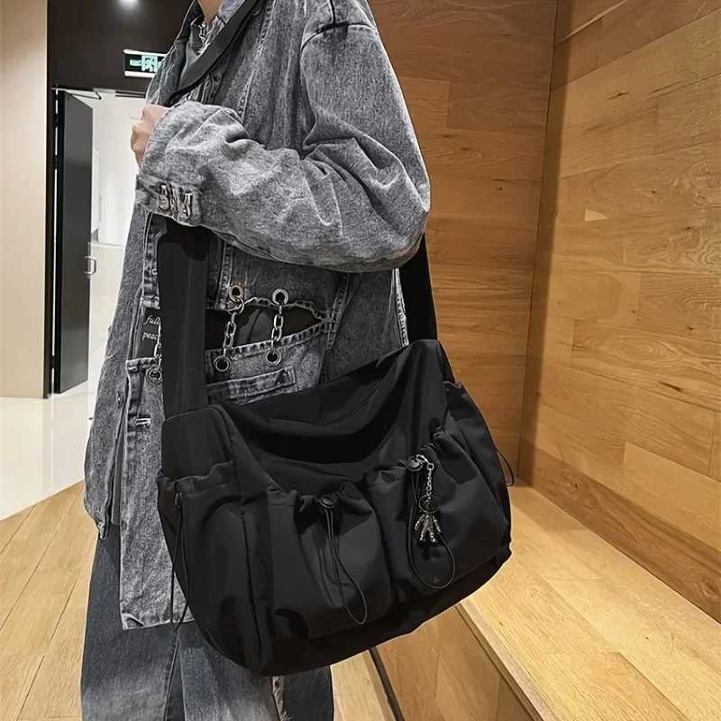 Fashionable Crossbody Bag with Drawstring Accent - Spacious Secure Zipper Closure - Includes Stylish Bag Charm Y250730