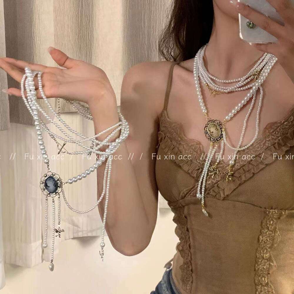 Angel Queen Multi-layer Pearl Tassel Necklace for Women Sweet Cool Light Sweater Chain Niche Design Choker 931
