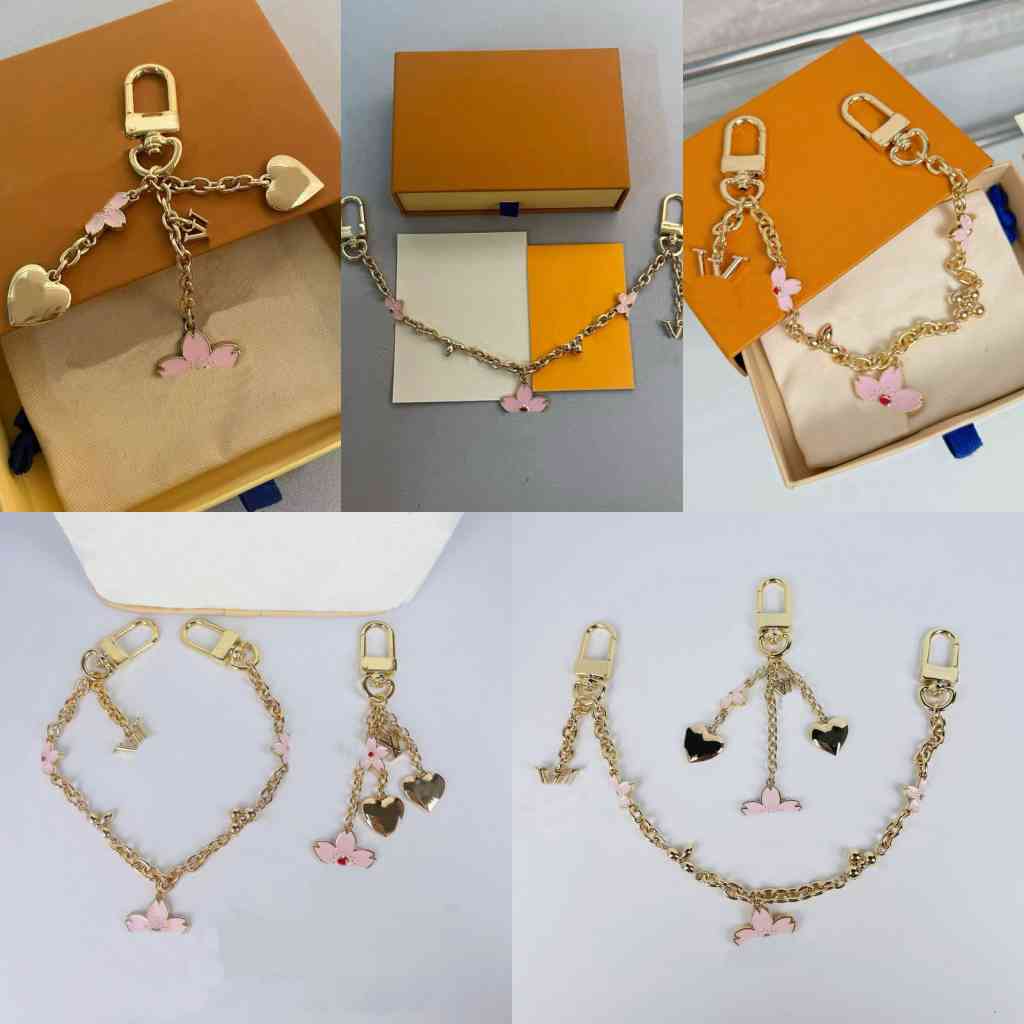 Fashion keyring designer bag charm key chain wallet designer cherry blossom bag extension chain keychain for women heart letter pendant jewelry accessories go0224
