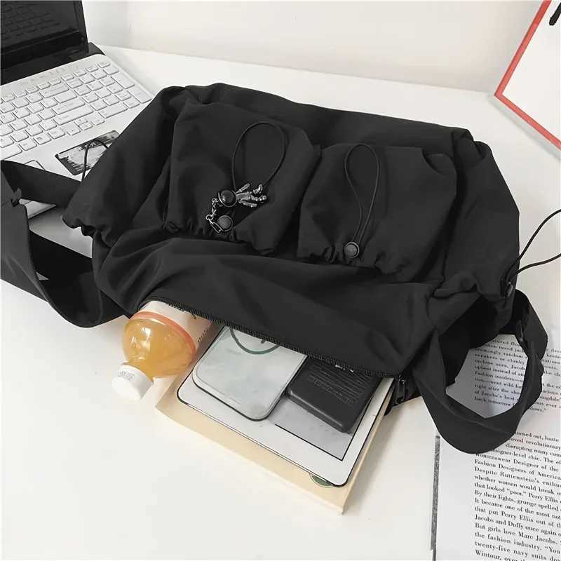 Fashionable Crossbody Bag with Drawstring Accent - Spacious Secure Zipper Closure - Includes Stylish Bag Charm Y250730