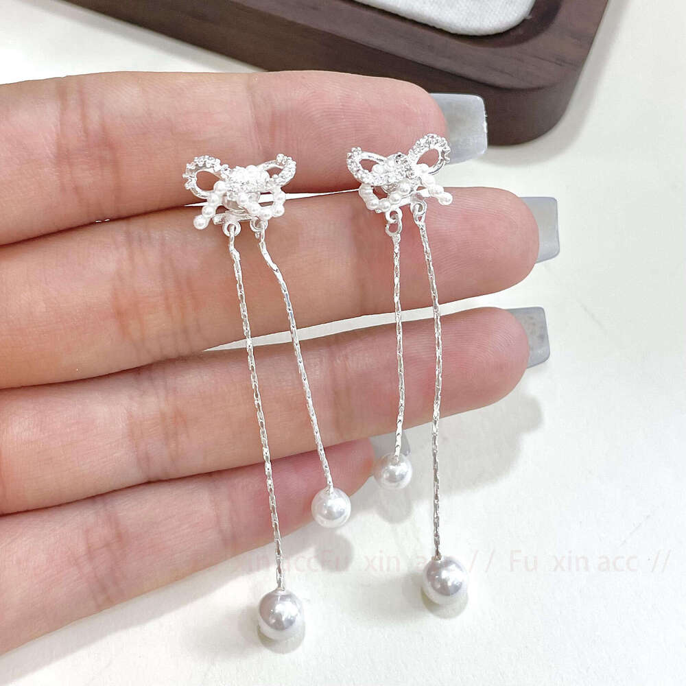 S Sier Needle Bowknot Tassel Sweet Cool Spicy Girl Social Details Artistic White Moonlight Holy Simple Women's Earrings 8e2