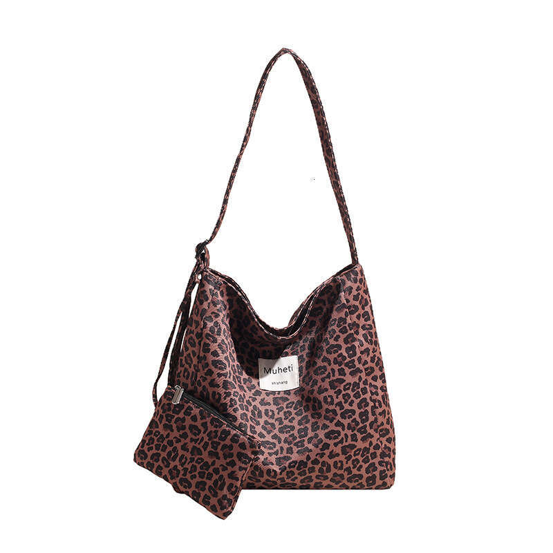 Leopard print canvas hand-held shoulder bag, large capacity mother and child bag design, fashionable street bag, casual versatile commuting women'