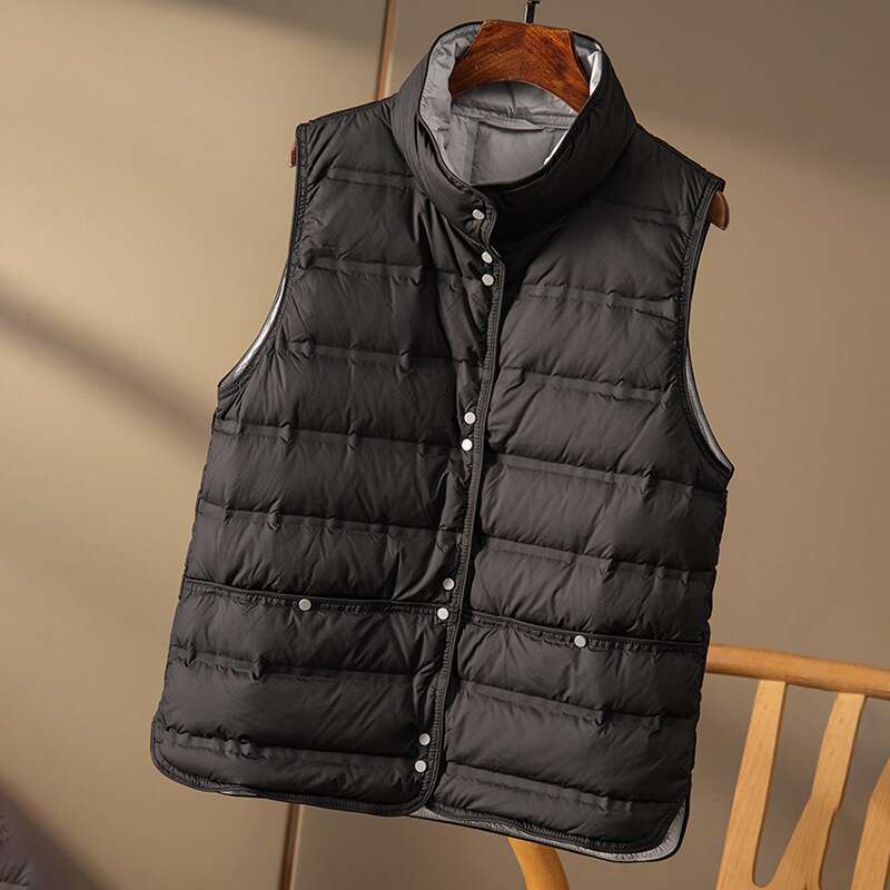 Designer Clothing 2025 Janveny 2025 New Winter Seamless Emed Puffer Gilets Women Ultra Light Stand Collar Short Vest White Duck Down Soft Waistcoat