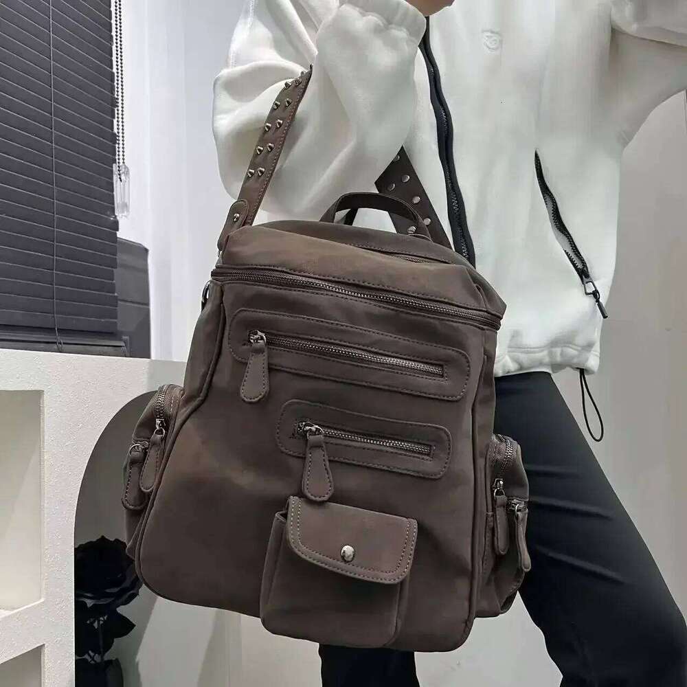 Ladies' Fashionable Frosted Vegan Leather With Large Capacity, Multiple Zippers, Rivets, And A Single Shoulder Bag