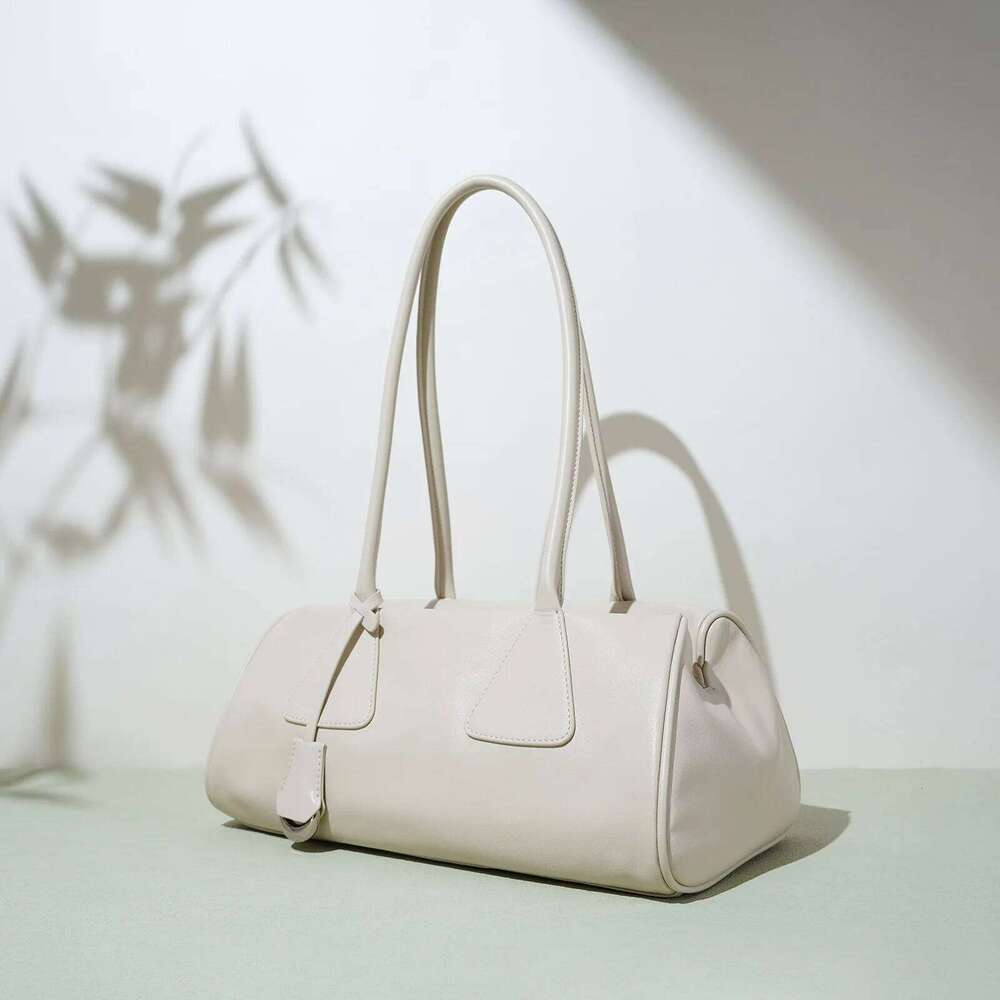 Genuine Women's Handbag 2025 New Niche Design Triangle Pillow Free Initials French Simple Top Leather Shoulder Bag