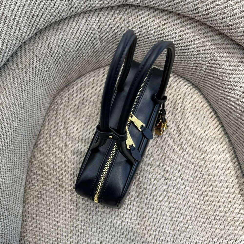 Cowhide Bowling 2025 New Vintage Lock Small Pendant Handbag Genuine Leather Women's Large Capacity Armpit Shoulder Bag